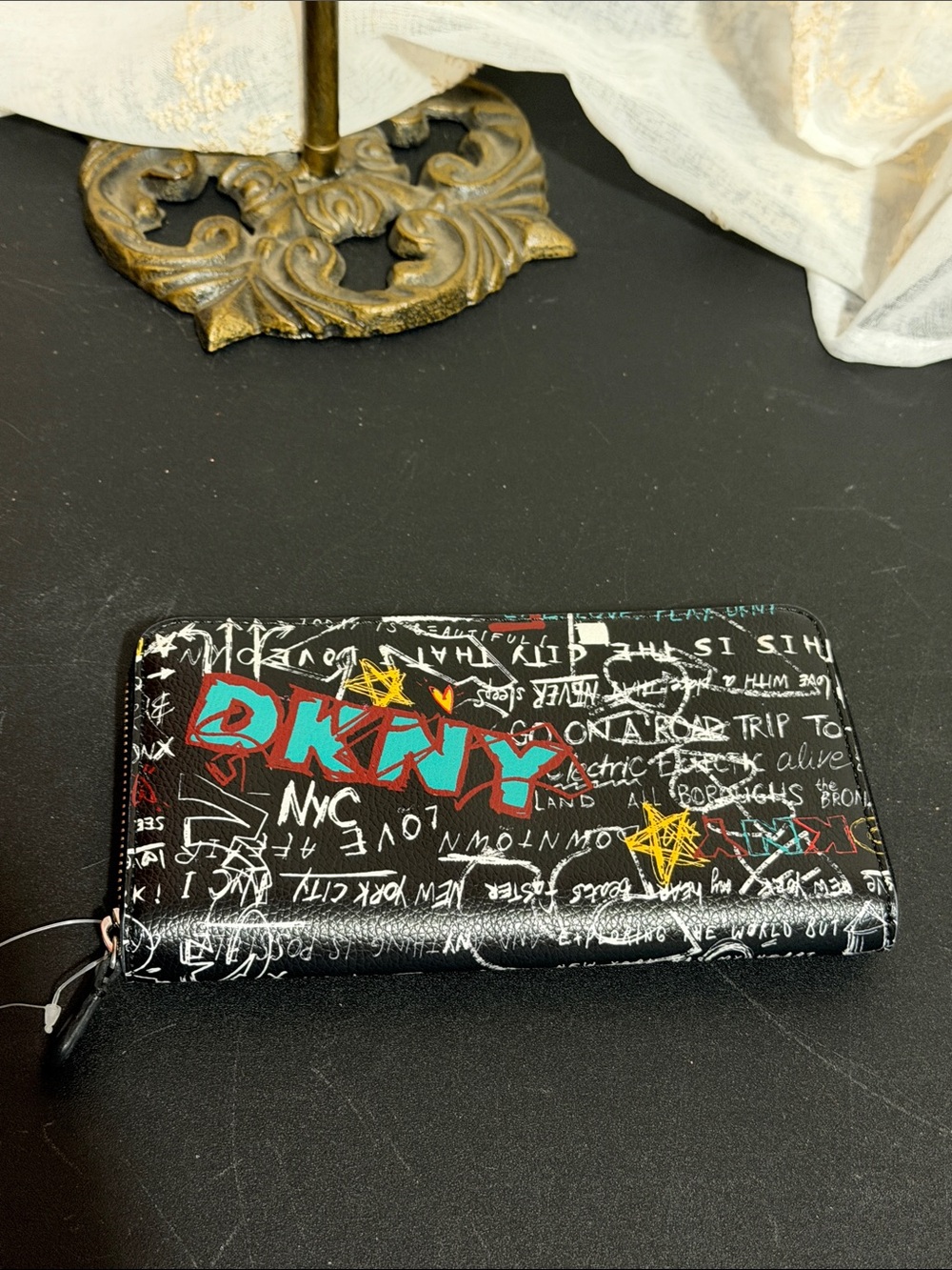 DNKY Vela graffiti-print large zip-around wallet